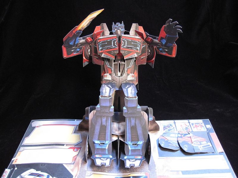 Transformers: The Ultimate Pop-Up Universe Book Cover and Optimus 